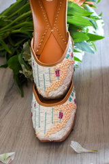 Colours of Sea & Sand Off-white Embroidered Jutti
